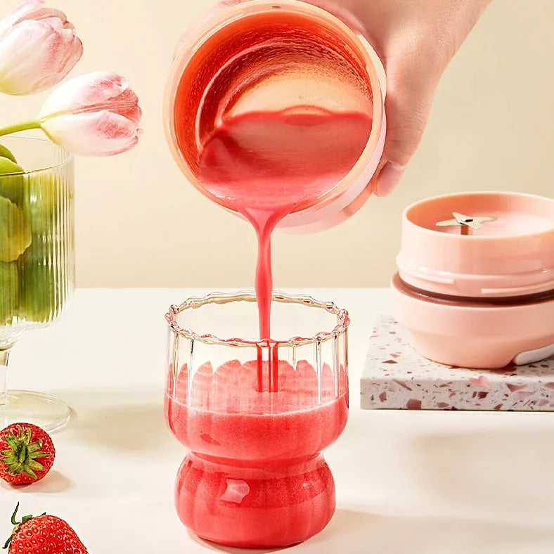 Portable blender juicer cup in green colour with 400ml capacity and stainless steel blades