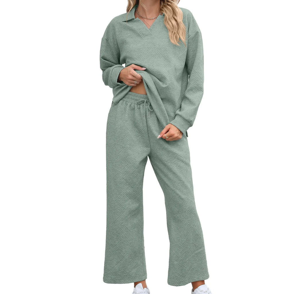 Women's solid colour knitted jacquard suit with lapel sweater and elastic waist cropped pants in black, navy, grey, khaki, or green.
