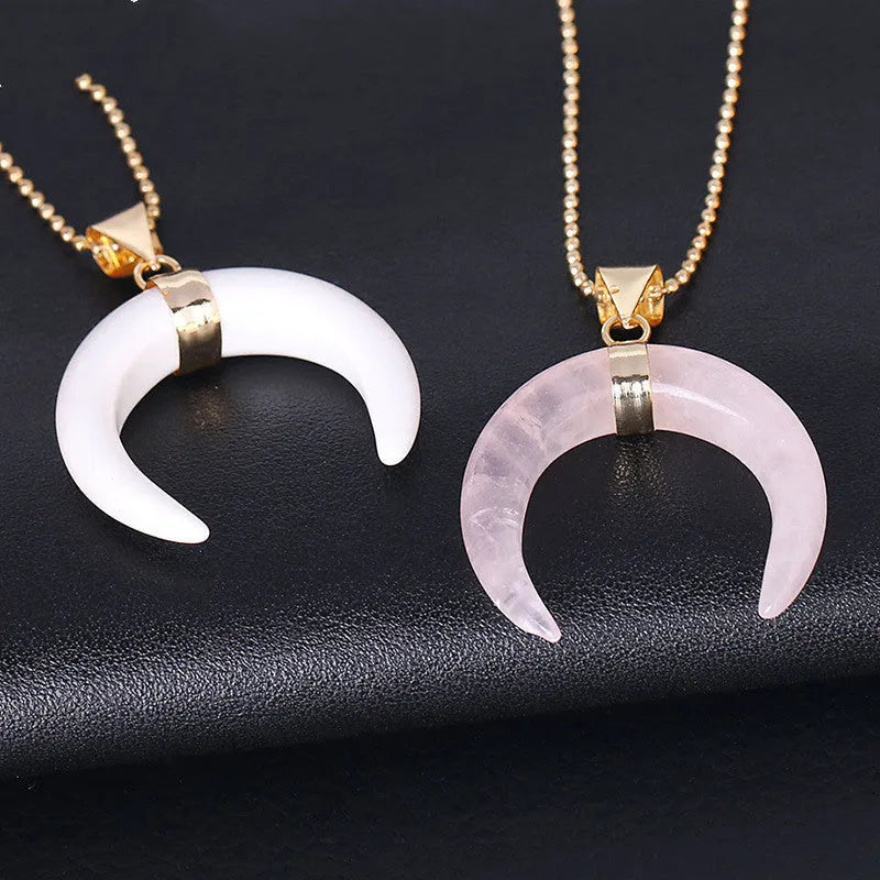 Crystal semi-precious stone moon pendant necklace on adjustable chain, showing natural stone details and copper fittings