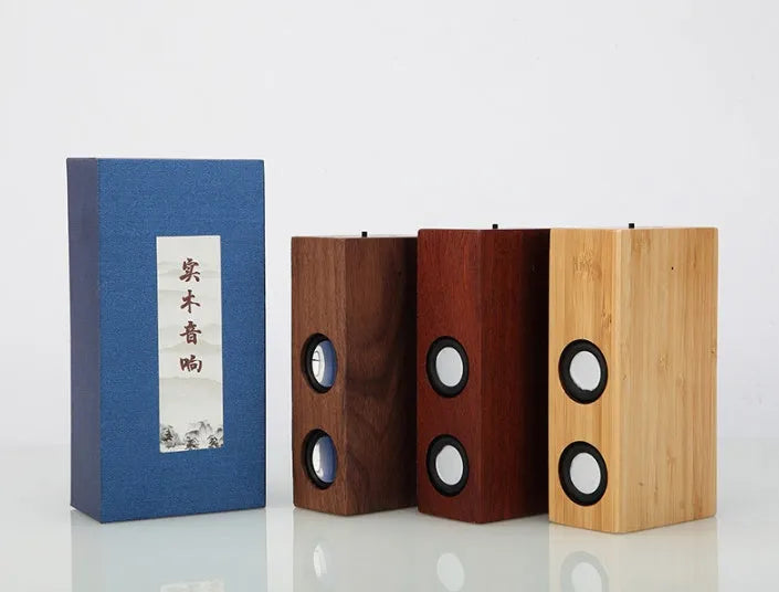 Retro wooden Bluetooth speaker in bamboo finish showing USB port and compact 15cm design