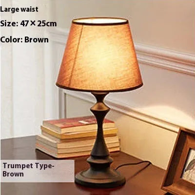 Retro bedside lamp with alloy body, adjustable LED lights, and optional 25x48cm speaker on a table