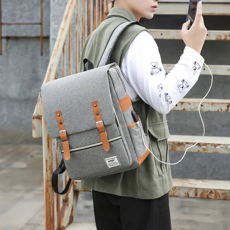 Three-piece business backpack in black with curved shoulder straps, multiple compartments, and waterproof Oxford cloth construction
