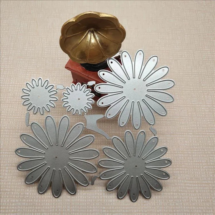 Silver floral design metal cutting die with hanging hook, 12.5cm by 13cm.