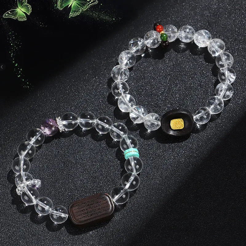 Natural white crystal ebony five warp bracelet on wrist showing wooden beads and ethnic design
