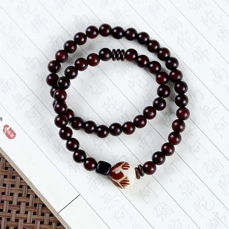 Natural rosewood double-ring bracelet with floral shape design measuring 10mm width