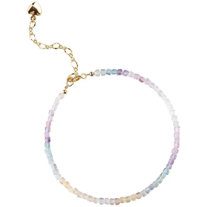 Handmade women's rainbow fluorite bracelet with copper geometric settings