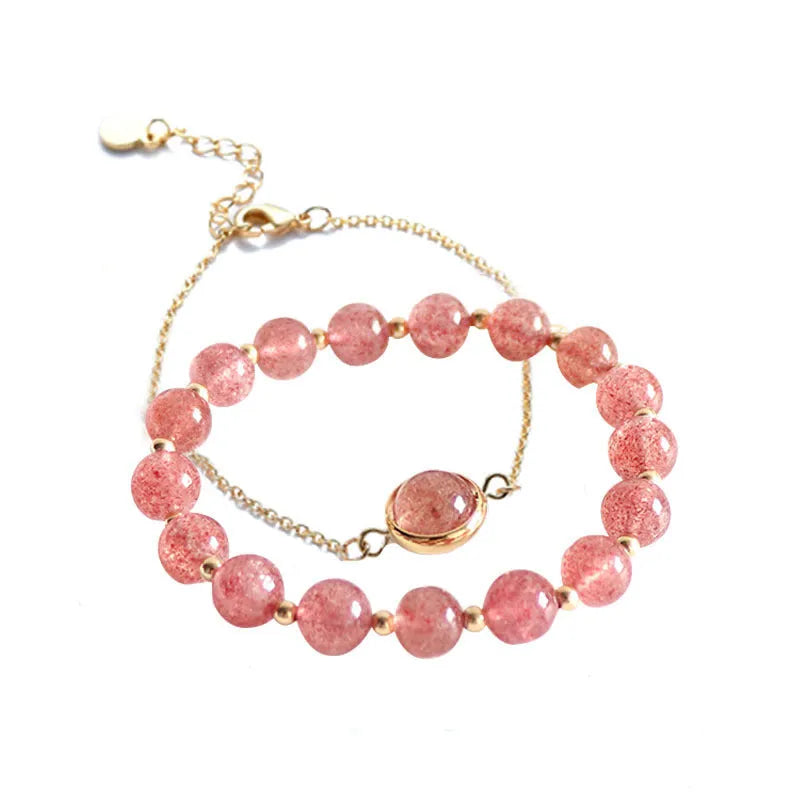 Women's double-layer copper bracelet with gold plating, strawberry quartz crystals, and lucky beads.