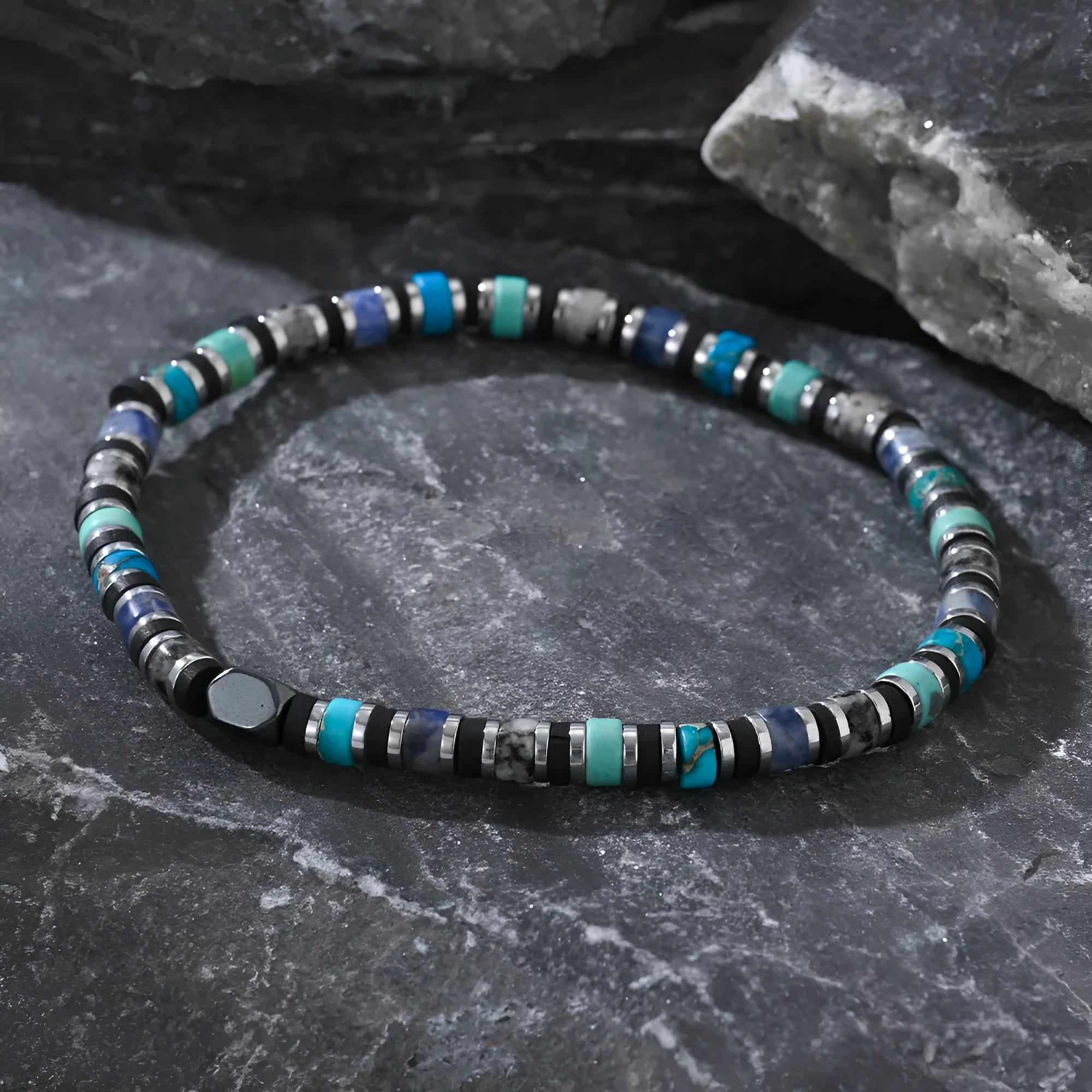 Hand-woven Bohemian bracelet with natural semi-precious stones in cylindrical geometric shape