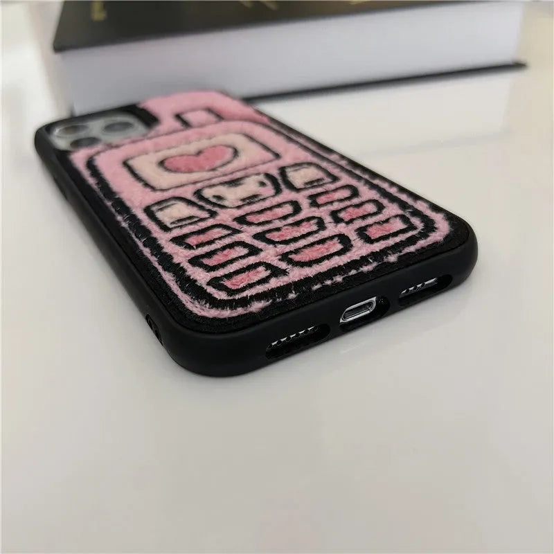 Pink TPU iPhone back cover case with a textured towel embroidery design.