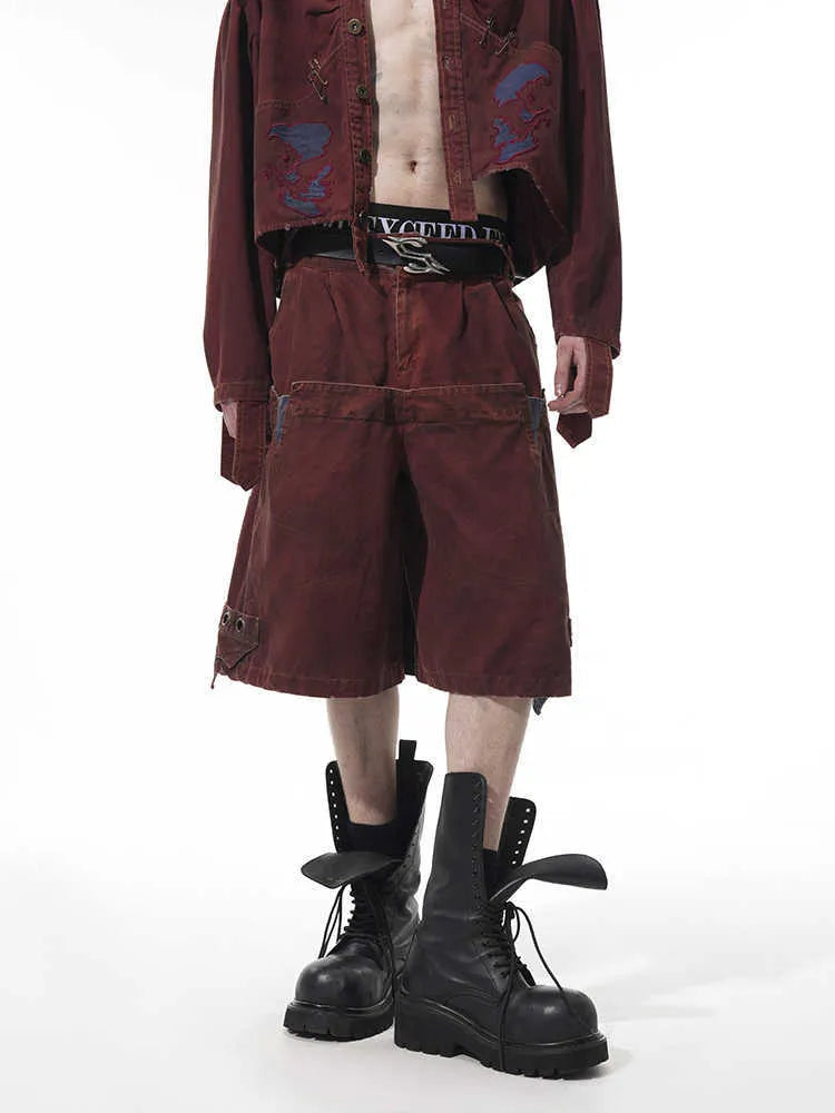 Men's black loose cropped pants with double waist design and washed stitching details