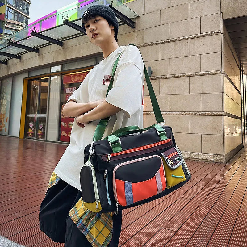 Large black sports shoulder messenger bag with a khaki colour option.