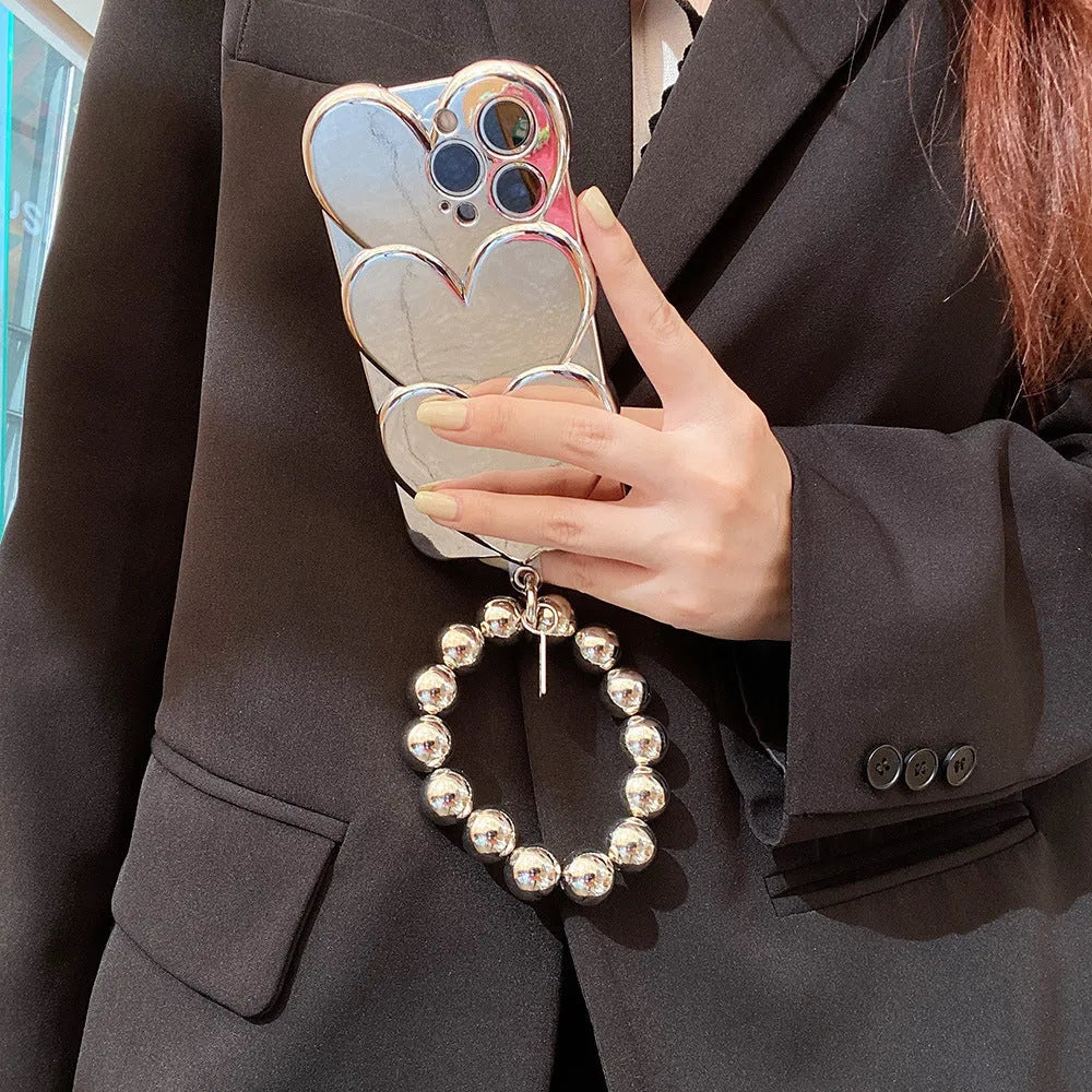 Soft TPU iPhone case with a shiny, three-dimensional electroplated love design on the back.