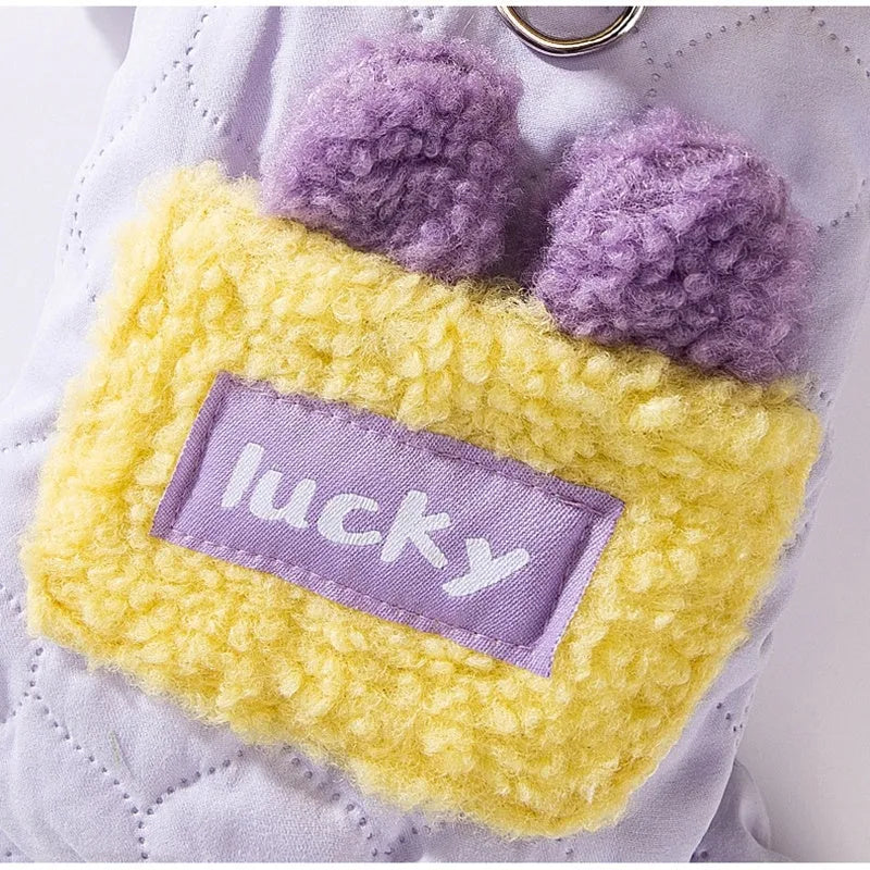 Four-legged plush dog coat with quilted outer layer, D-ring, bear ears, and patch pocket in olive green.