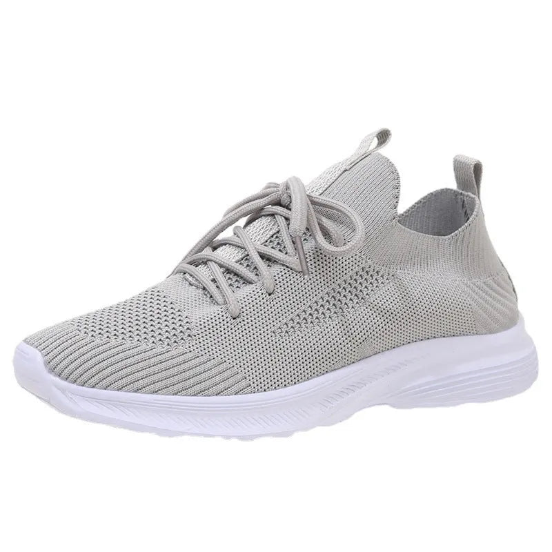 Women's breathable running shoes with mesh lining and Flyknit upper in tennis shoe style