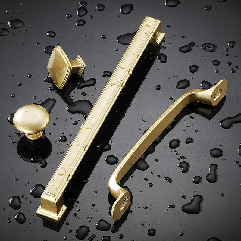 Gold T-shape single hole cabinet handle with aluminium alloy construction and multiple hole spacing options