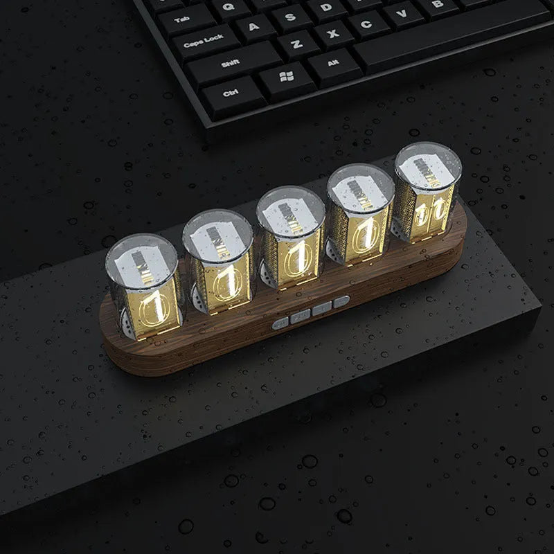 RGB LED digital tube clock showing colourful time display on a desk.