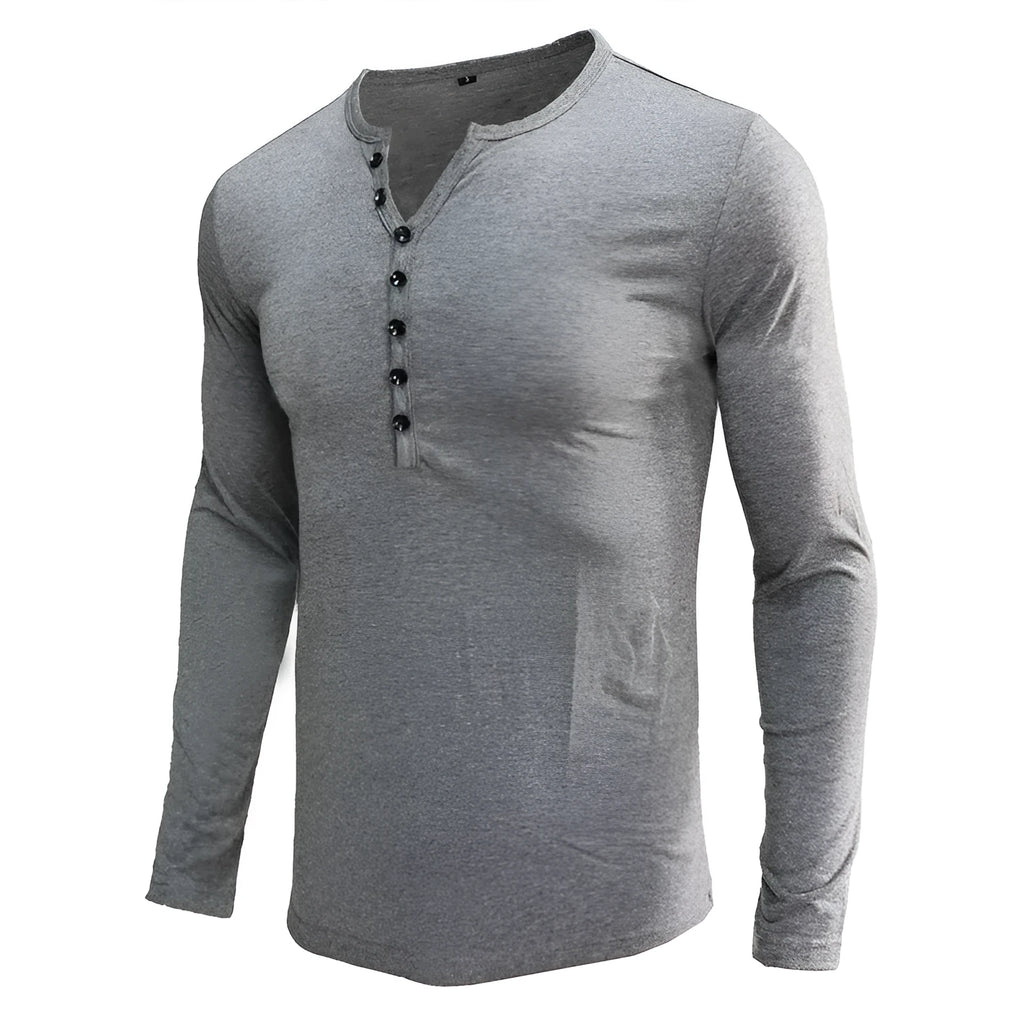 Men's long sleeved blue Henry collar pullover shirt laid flat, showing cotton blend fabric texture.