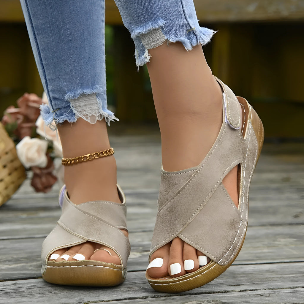 Women's brown Roman platform sandals with an ankle skirt and Velcro strap