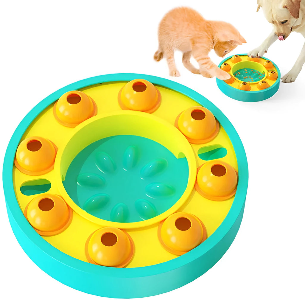 Square green interactive dog puzzle feeder bowl with central column and top turntable on a non-slip base.