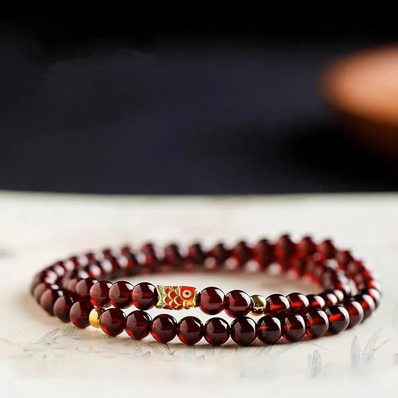 Women's wine red bracelet with garnet design in glass and coloured glaze