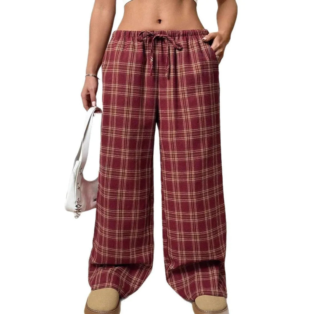 Women's plaid trousers with drawstring waist and pockets in blue and red colours