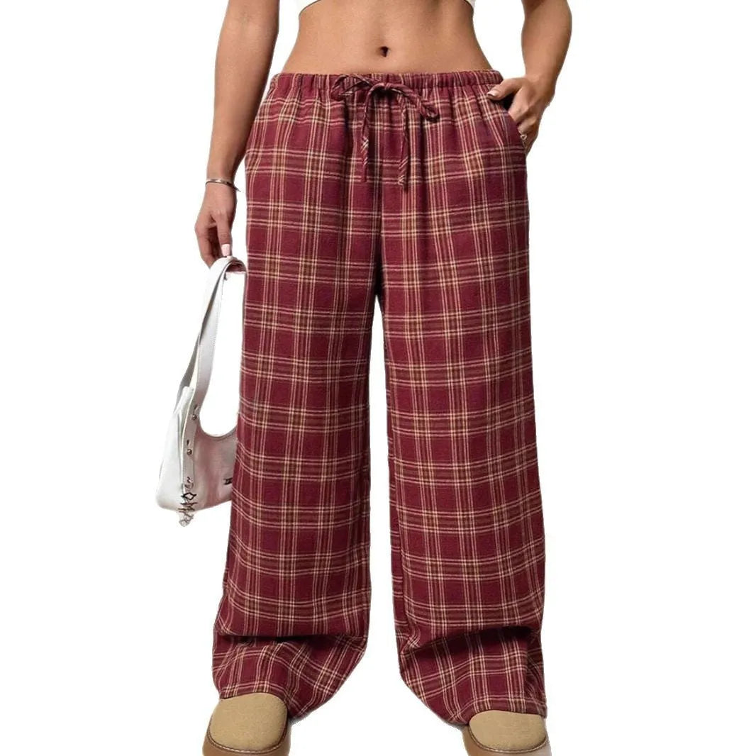 Women's plaid trousers with drawstring waist and pockets in blue and red colours