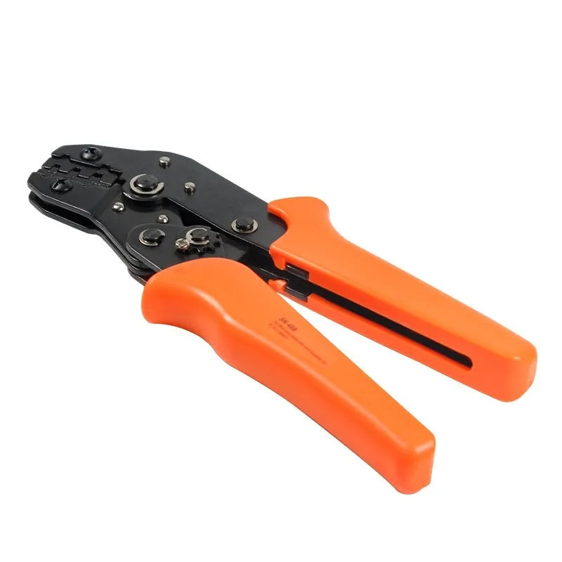 SN-48B portable terminal crimping pliers combination set with multiple jaw tools on a work surface.