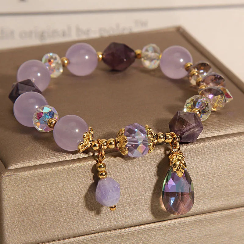 Lavender purple crystal water drop bracelet for children in a retro design.