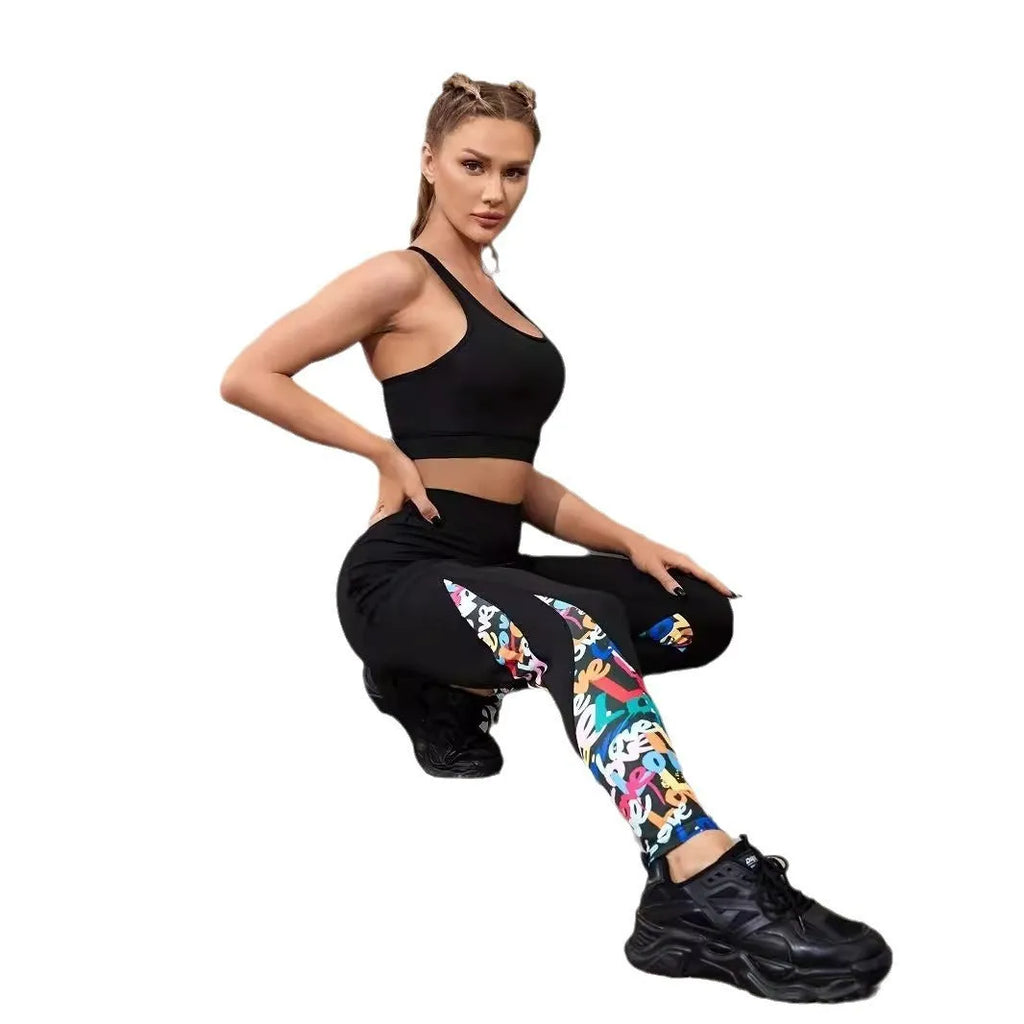 Women's black polyester yoga leggings with side pocket and leopard print pattern detail