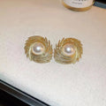 Women's electroplated alloy vintage earrings with pearl flower design