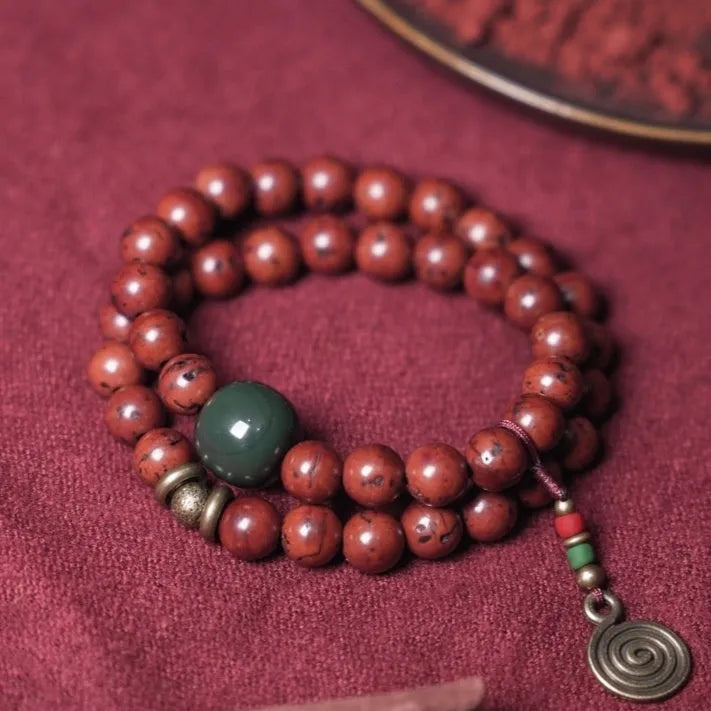 Bird's eye bodhi double circle bracelet showing hand-processed natural seeds in retro cartoon style