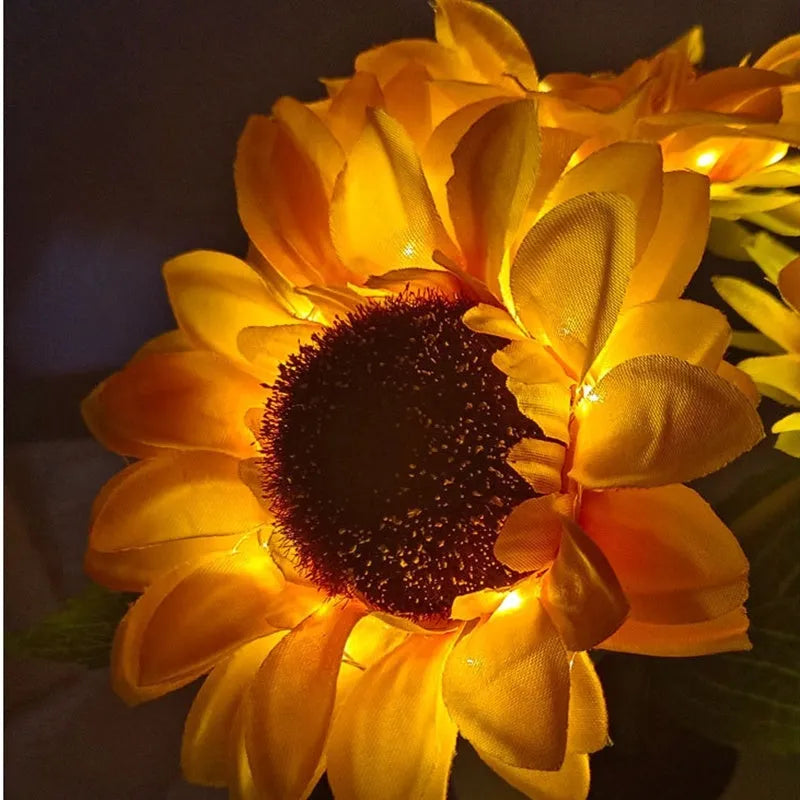 Rechargeable artificial sunflower LED night light on a table