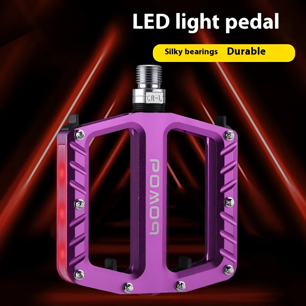 Pair of aluminium alloy bicycle pedals with integrated LED lights in multiple colour options