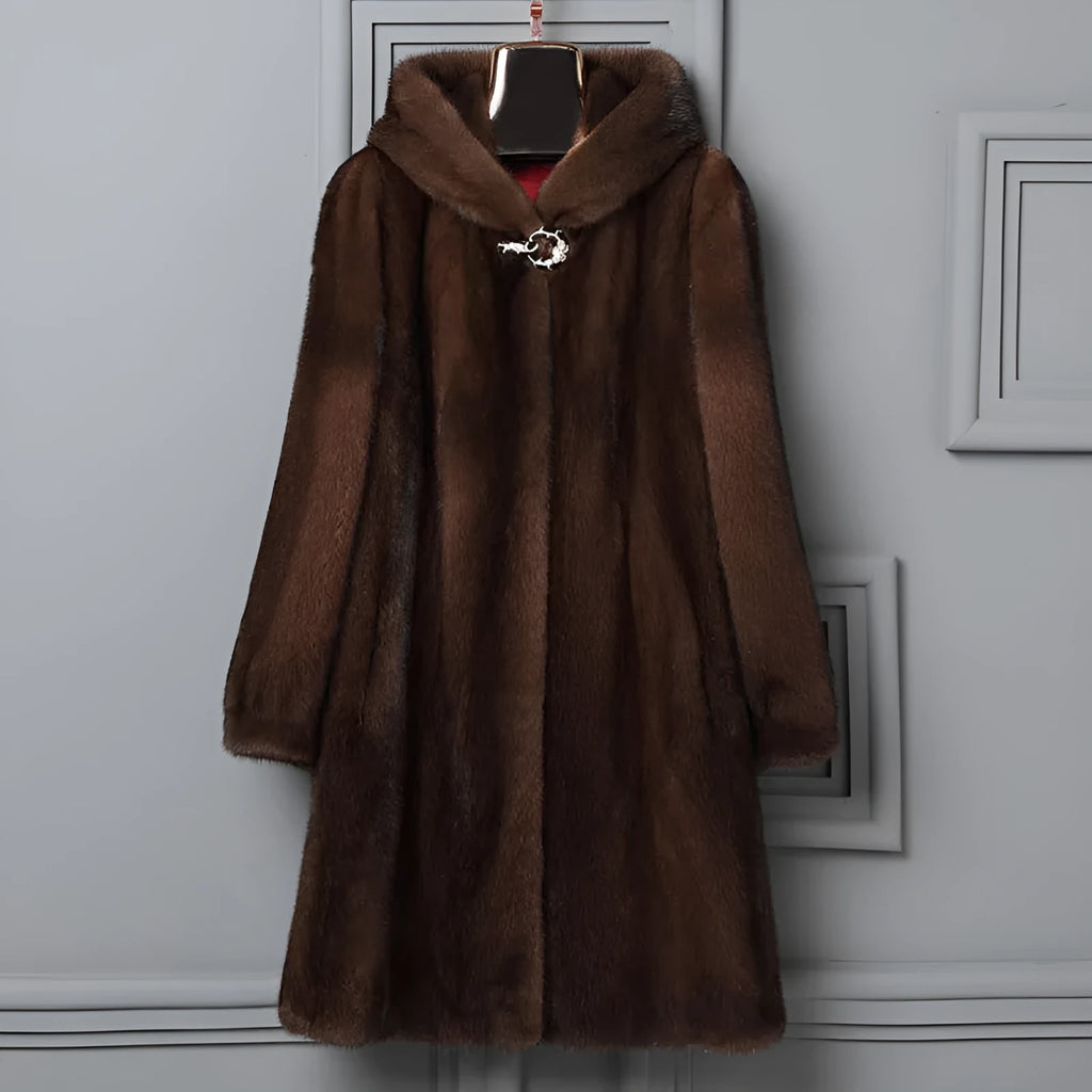 Women's long black hooded faux fur coat for autumn and winter, shown on a hanger.