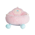 Grey plush circular pet nest bed with high sides for a cat or dog to sleep in.