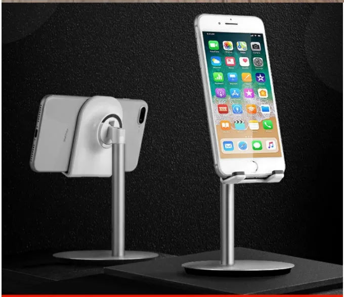 Silver S1 model metal desktop holder with a mobile phone and tablet showing universal 3-11 inch fit.
