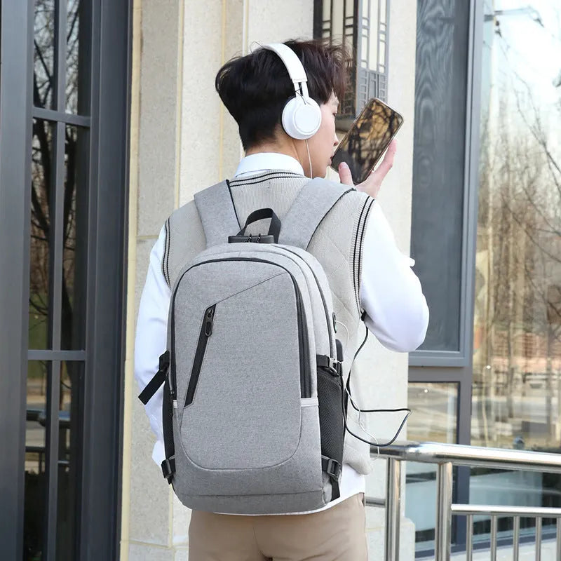 Oxford cloth computer backpack with 20-35L capacity showing grey colour option and organisational compartments