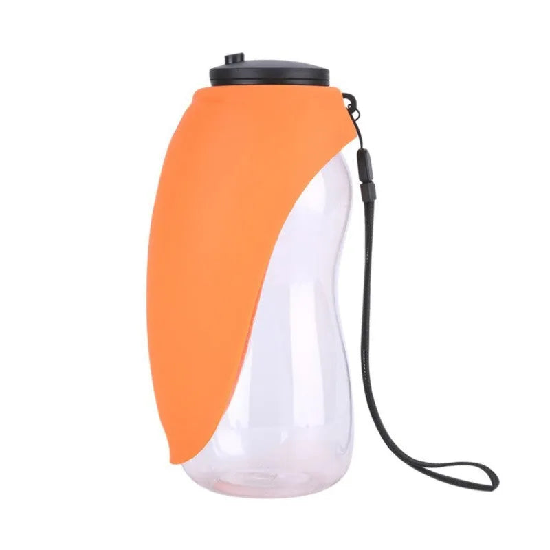 Portable blue pet water bottle with drinking bowl and carrying strap for outdoor use with dogs