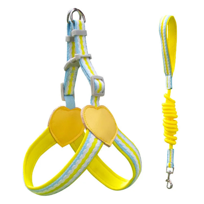 A pink nylon dog chest strap harness connected to a 1.5 metre long matching rope lead on a neutral background.