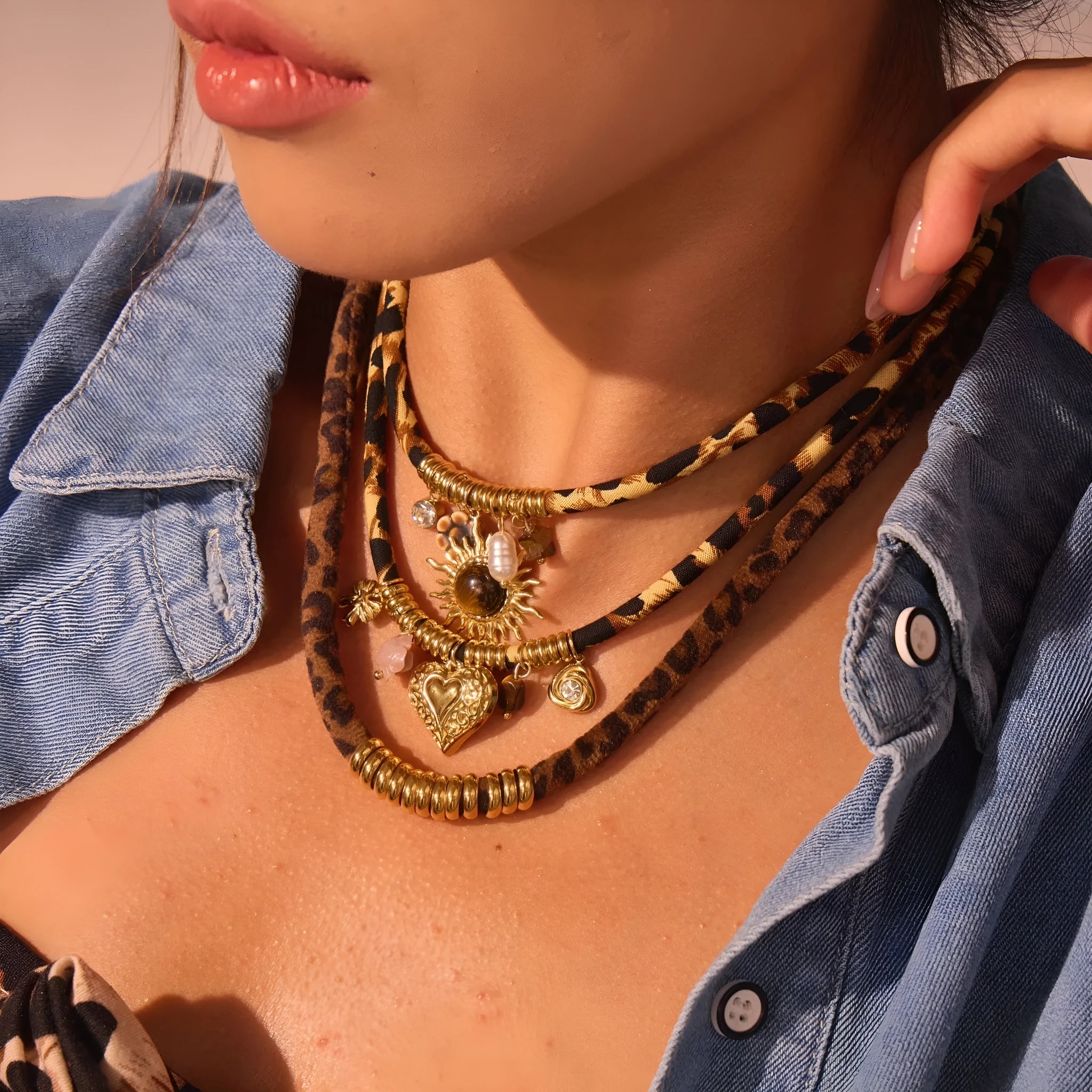 Gold geometric leopard series pendant on an adjustable stainless steel necklace chain.