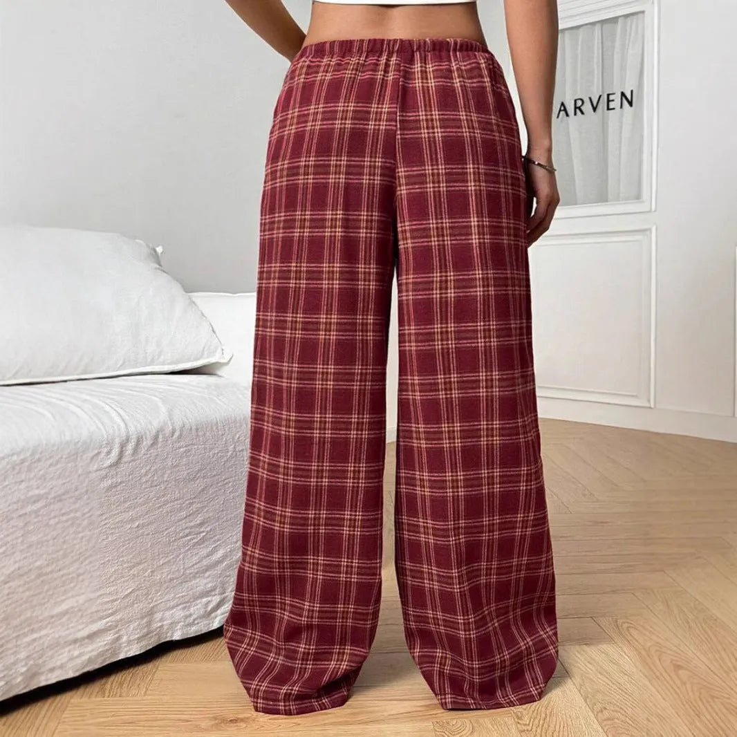 Women's plaid trousers with drawstring waist and pockets in blue and red colours
