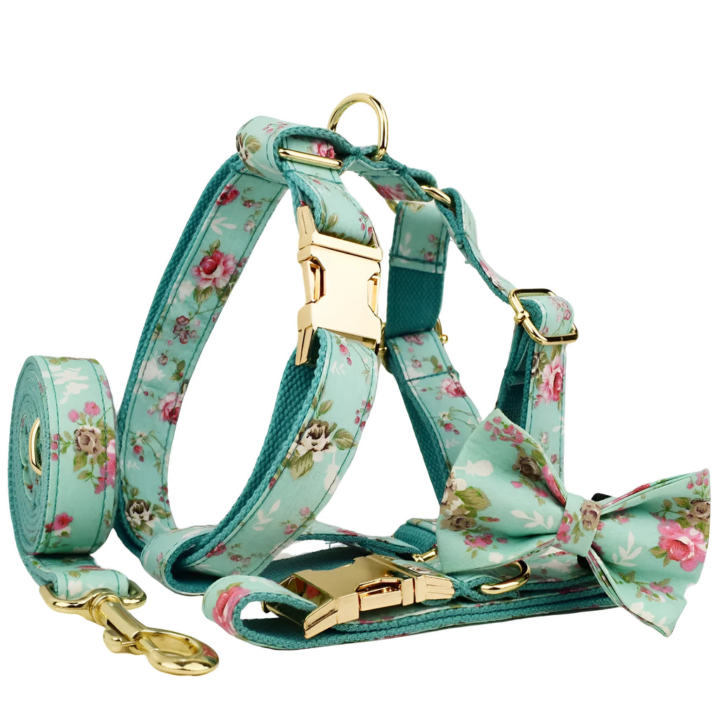 Rose pattern with green background fabric dog collar, leash, detachable bow, and vest set for pets.