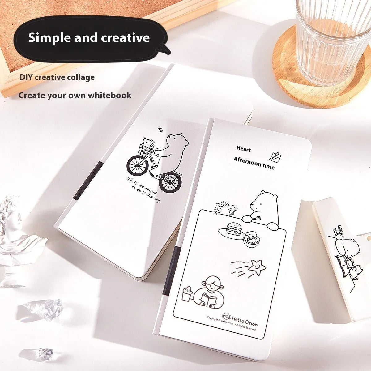 Small white paper notebook with plaid design, showing cover colour options and included stickers
