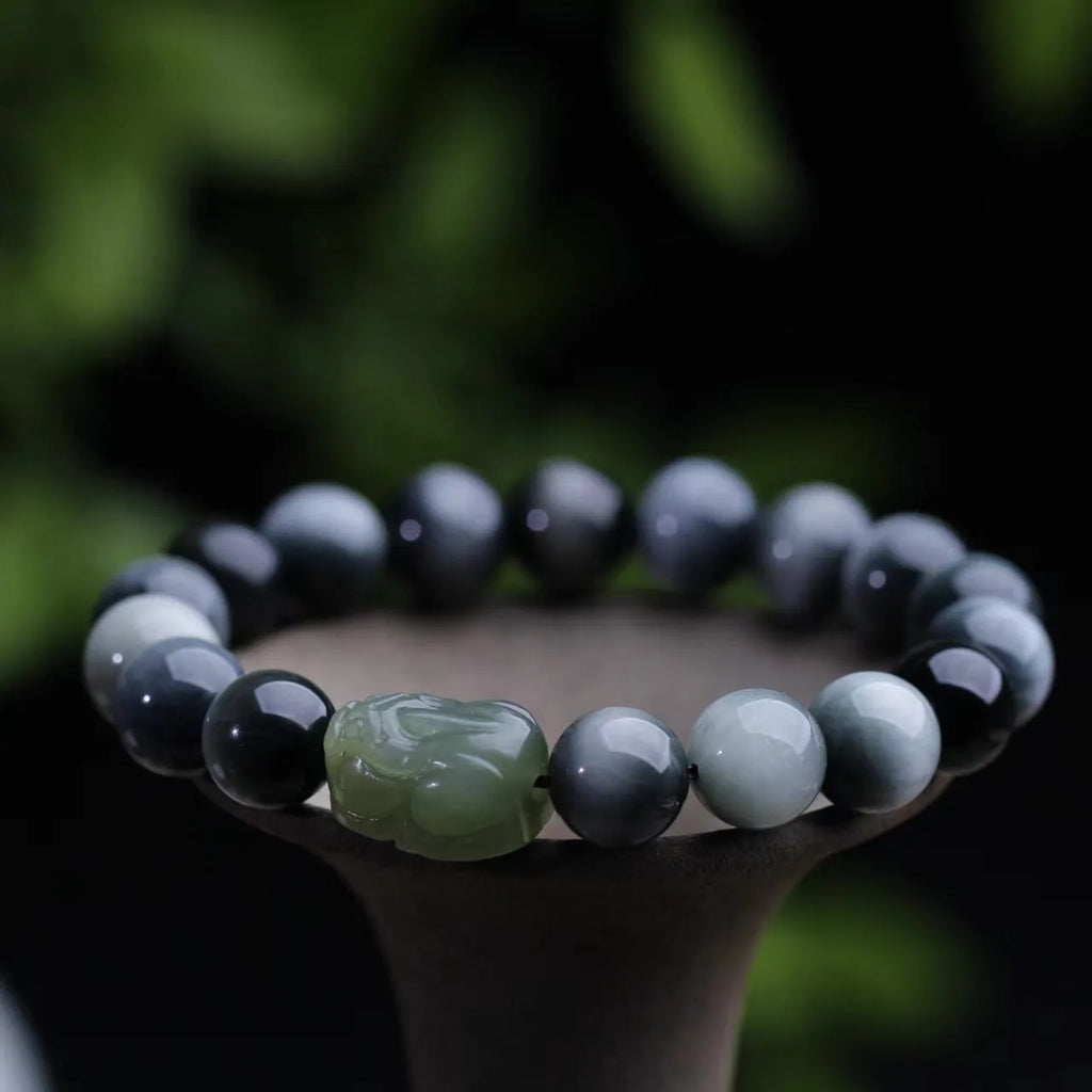 Black Eagle Eye Stone bracelet with Hetian Jade Pixiu charm and 10mm beads