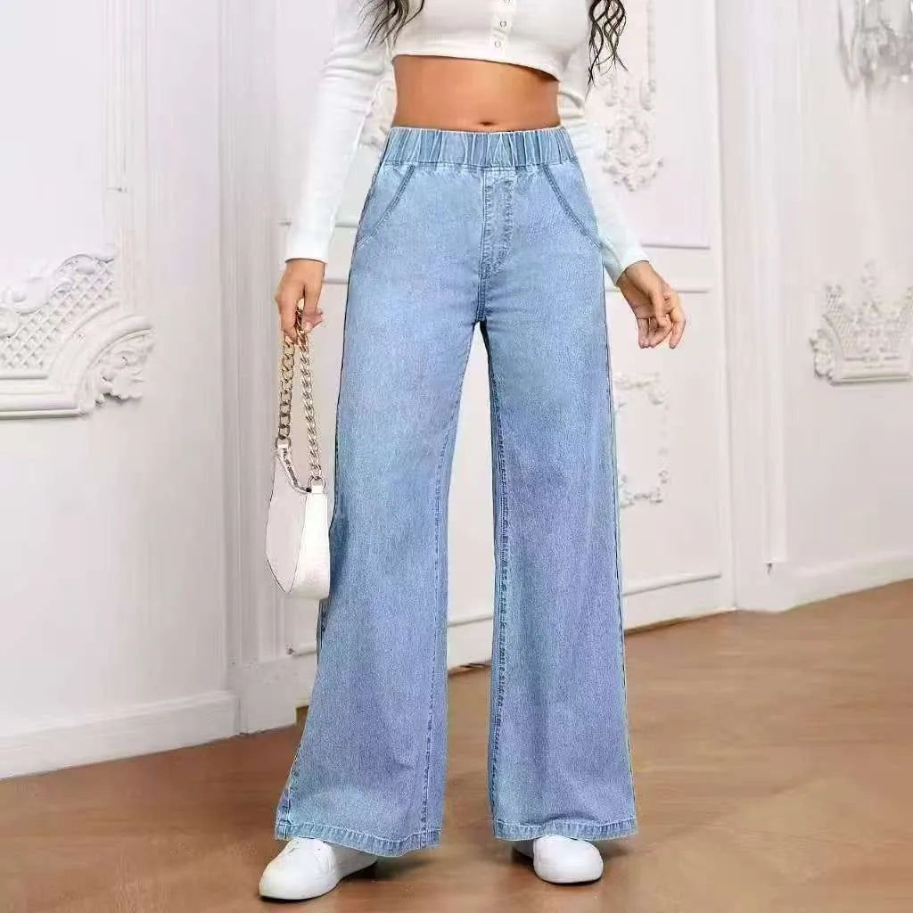 Light blue washed wide-leg straight jeans with mid-waist design and zip placket closure on hanger