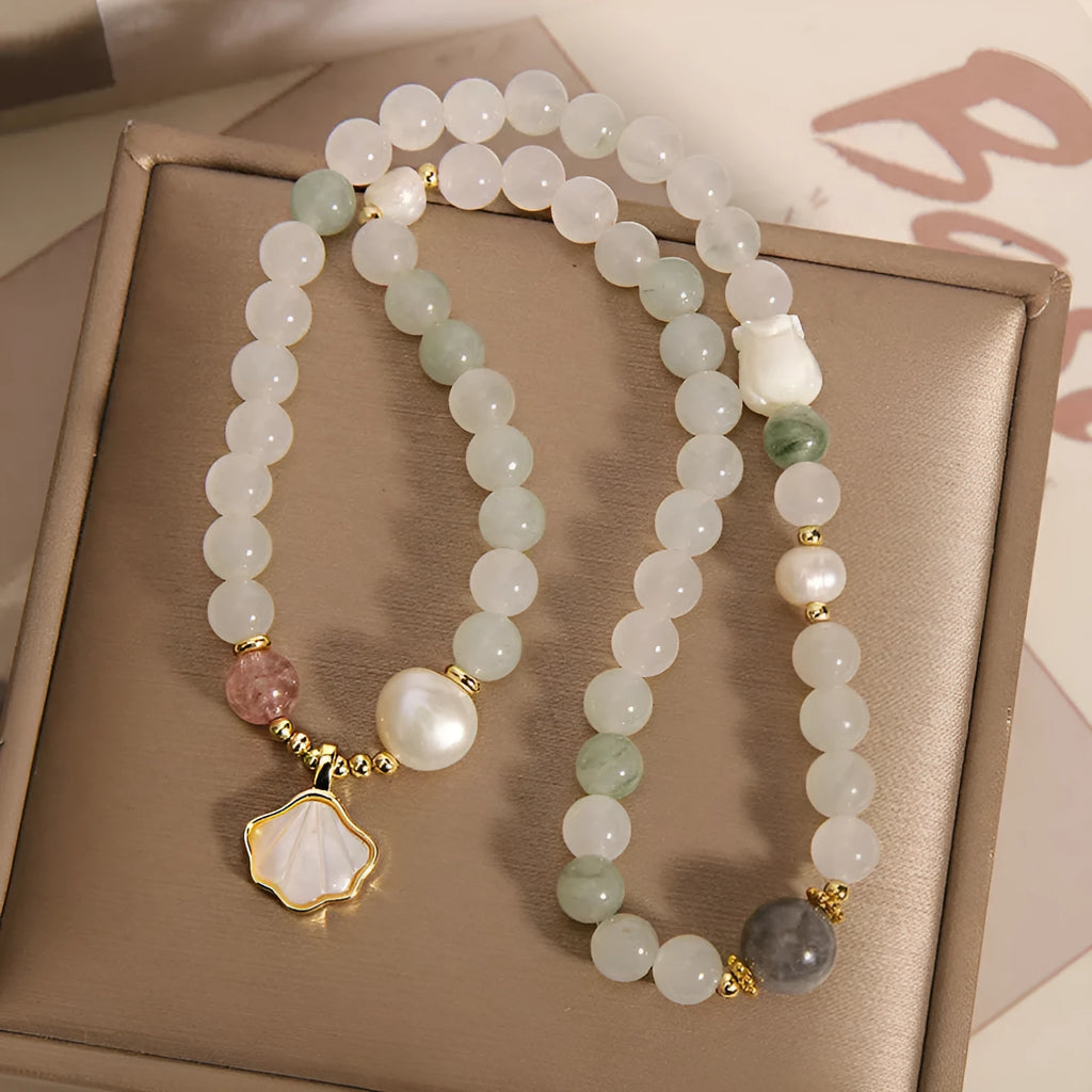 Crystal bracelet with Tianshan jade shell ginkgo leaf pendant and gold-plated gemstone settings