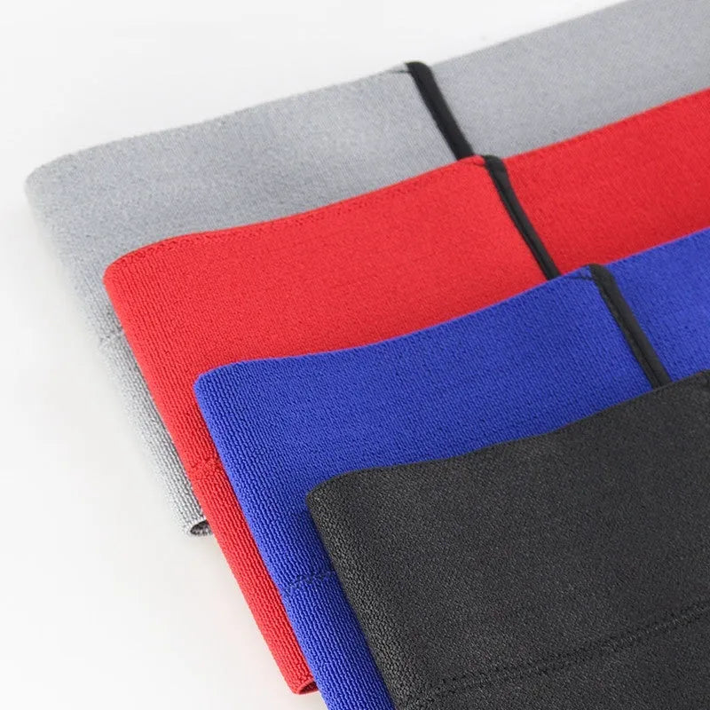 Fitness elbow joint resistance bandage in red, grey, blue, or black colours, available in S, M, L sizes for boxing and exercise support.