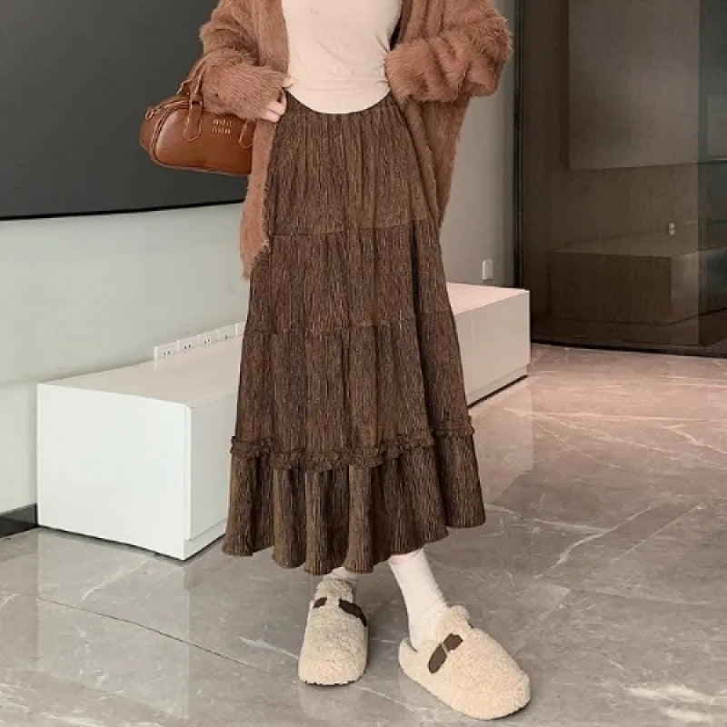 A-line corduroy midi skirt with elastic waistband in milky white colour showing 70cm length and ribbed fabric texture