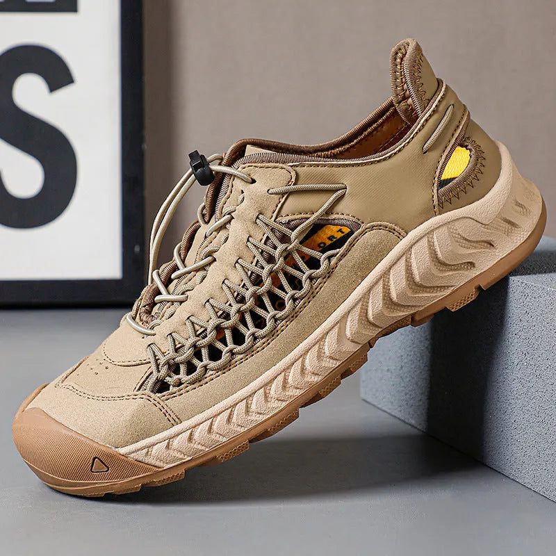 Men's hand-woven closed-toe sandals with an elastic band and rubber sole in a light grey colour.