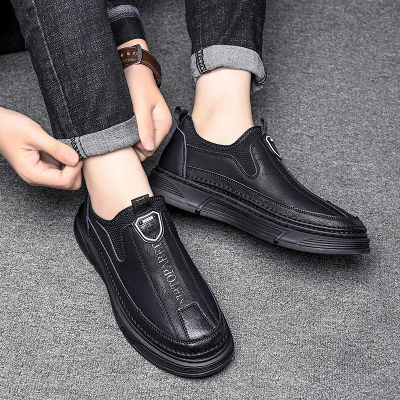 Men's solid colour leather casual shoes with round toe in black and brown colour options.